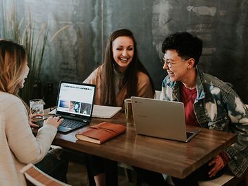 A group of laughing people of the generation z