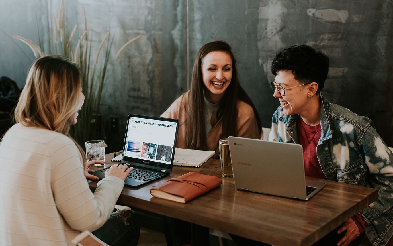 A group of laughing people of the generation z