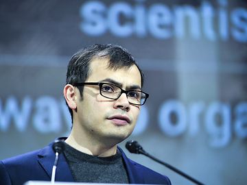 Demis Hassabis giving a speech