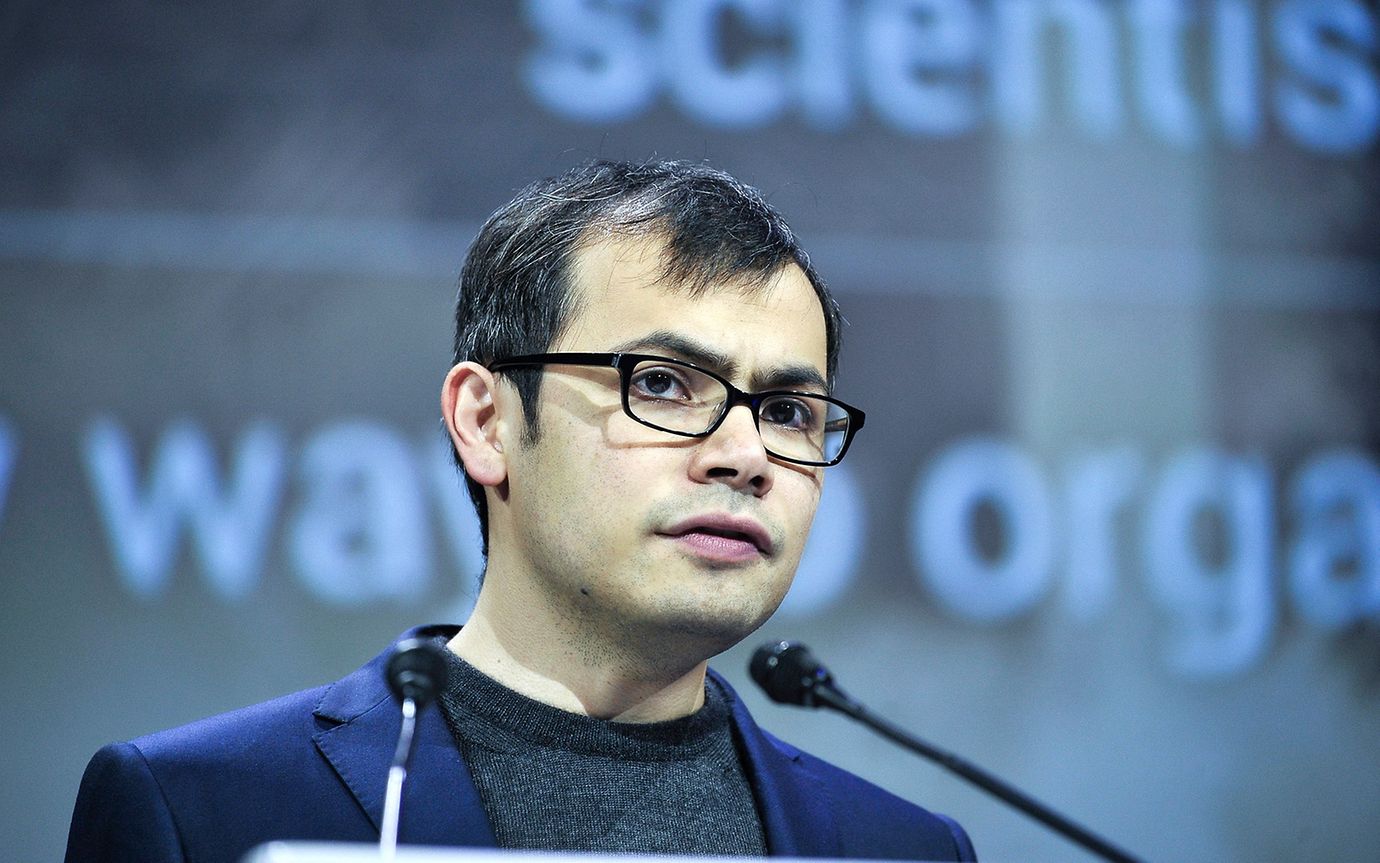 Demis Hassabis giving a speech