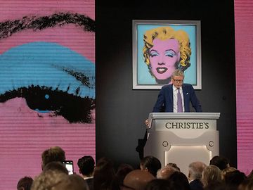 Start of the auction of Warhol's Marilyn Monroe portrait