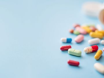 Colorful Pills on a light blue background