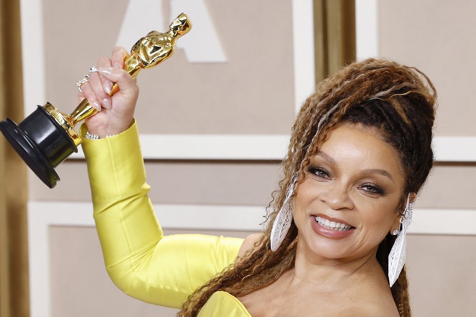 Ruth Carter is holding an Oscar