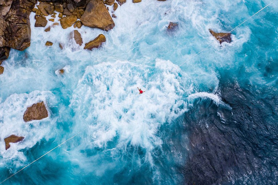 A tightrope walk over rocky waters