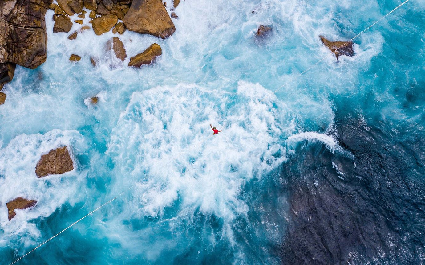 A tightrope walk over rocky waters