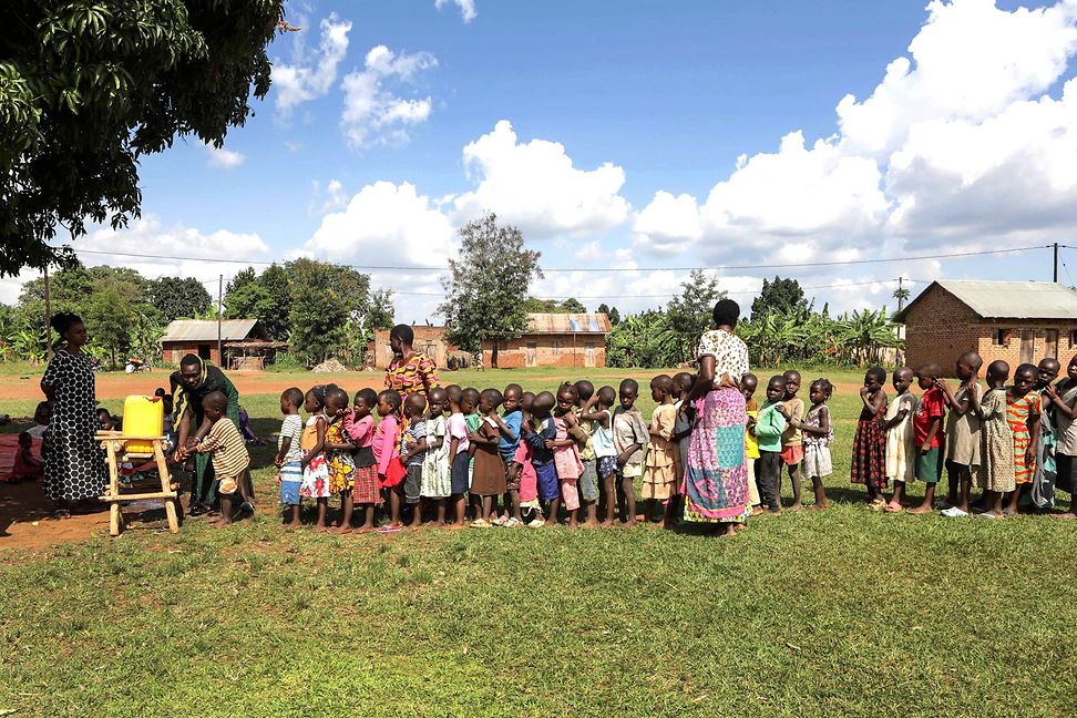 A group of children under a tree