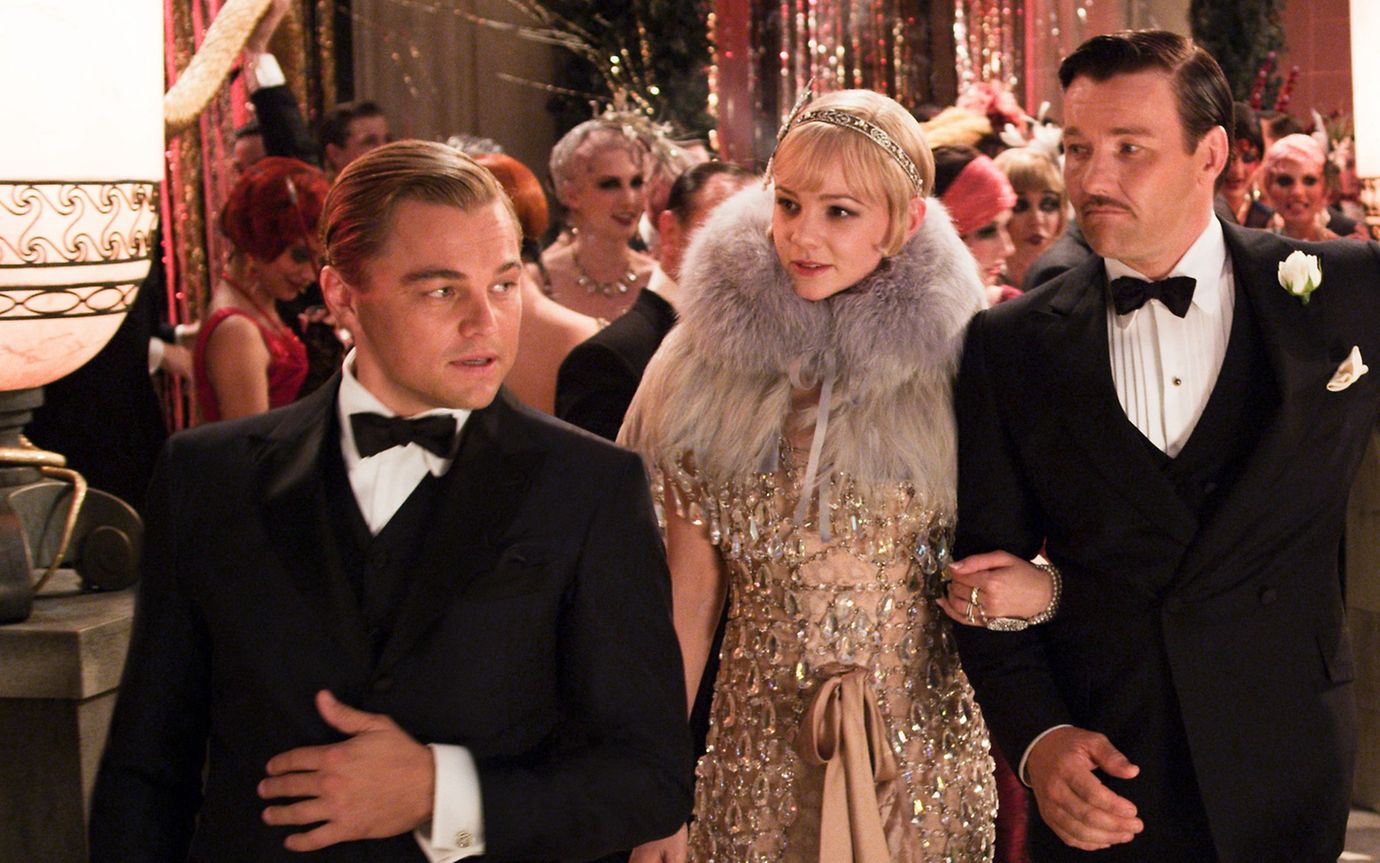  Baz Luhrman's "The Great Gatsby" movie scene: Gatsby leads his guests through the party hall