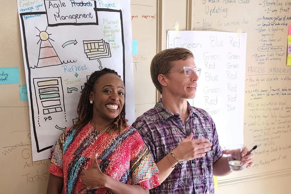 Tundu during a workshop with a thumbs up