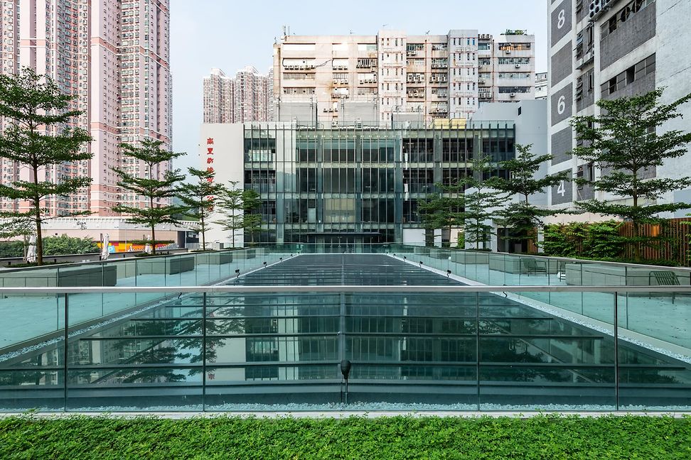 Modern building between sky scrapers