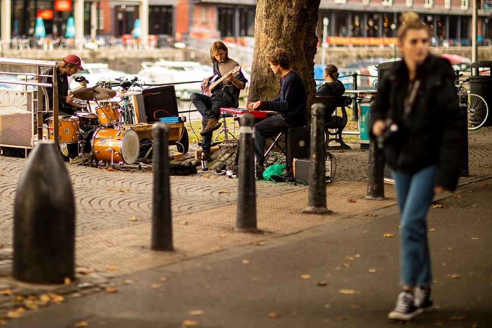 Small band performing on the street in Bristol